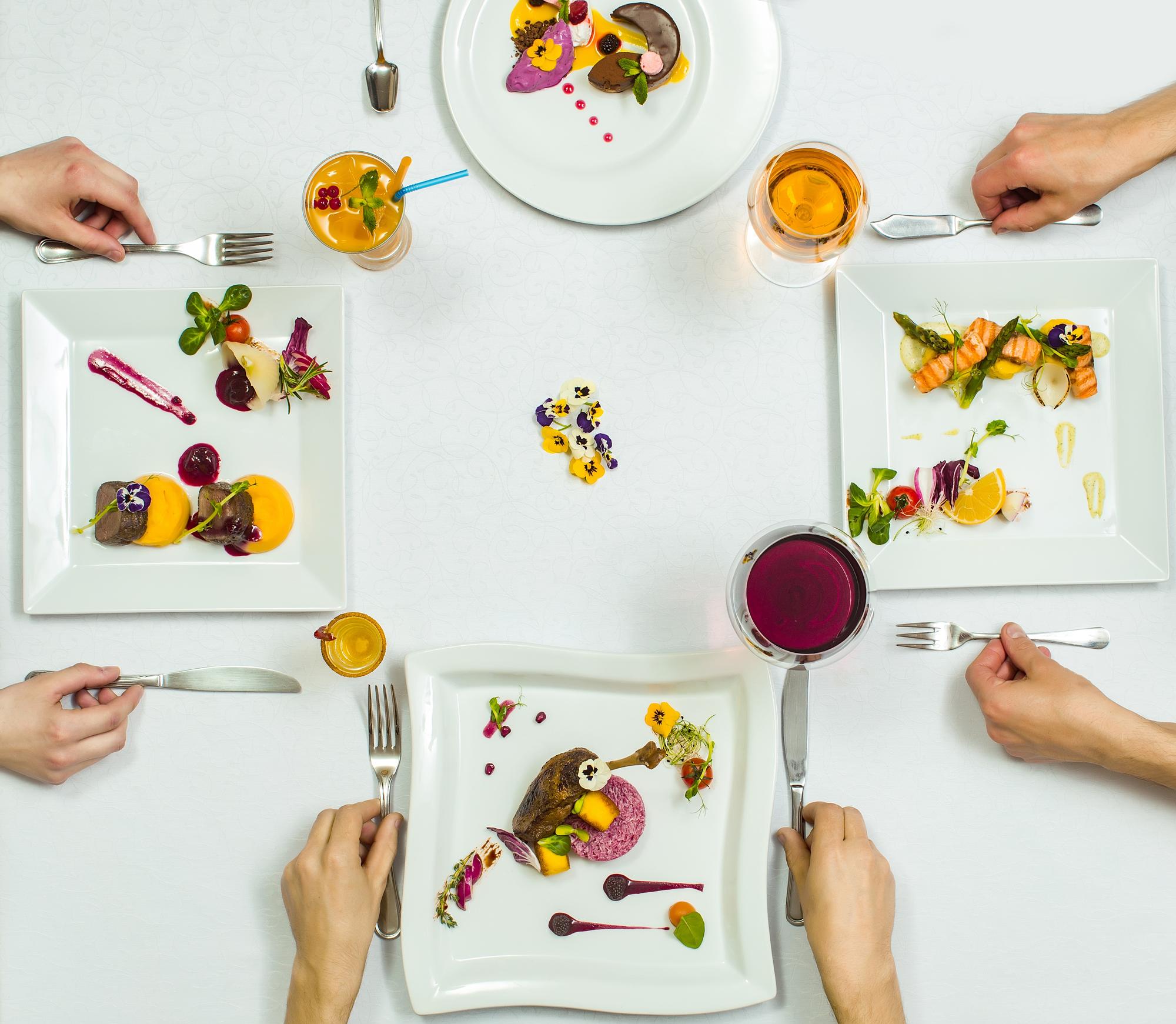 Small group tasting plated dishes